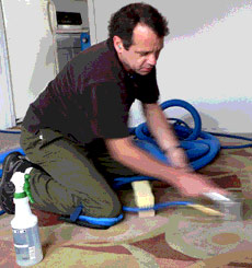 Harry Beck cleaning carpets